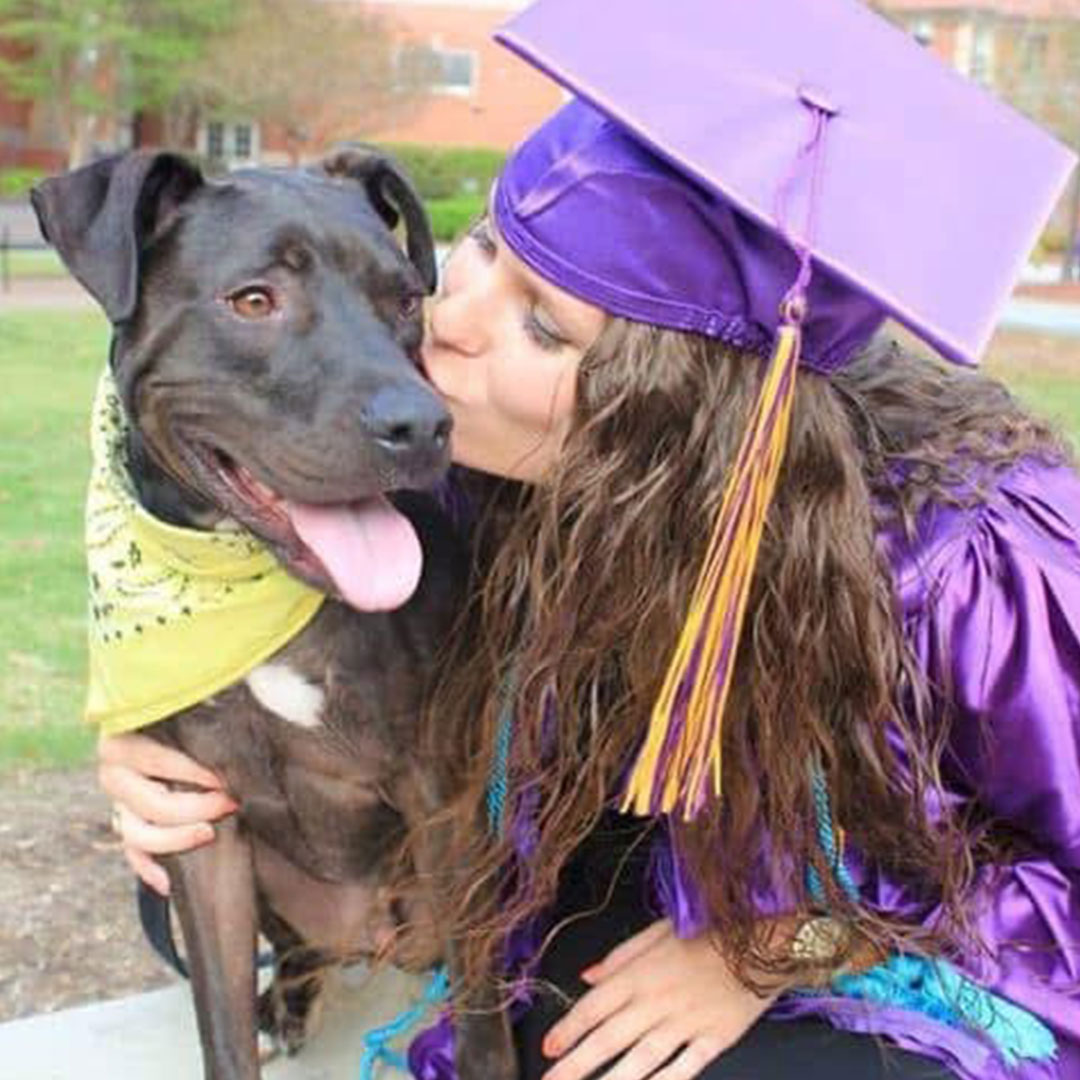 Dedicated-team-_-2 Graduated woman with a dog